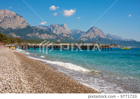 Shingle beach and sea view in Kemer, Turkey. Shingle beach and sea view in Kemer, Turkey. 9771720