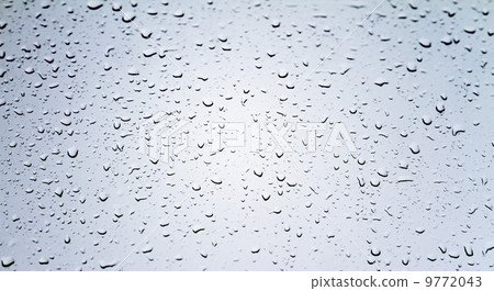 Drops of water on glass 9772043