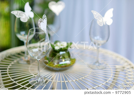 Some wine glasses decorated with butterflies Some wine glasses decorated with butterflies 9772905