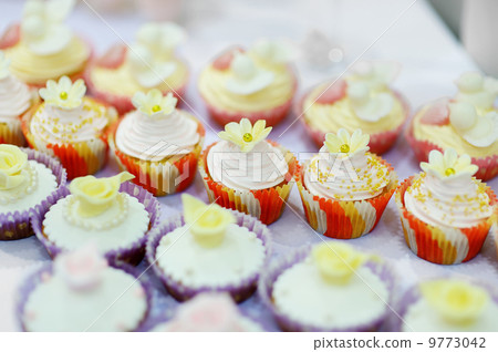 Colorful decorated cupcakes 9773042