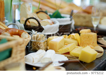 Fresh cheese and bread on a table 9773212