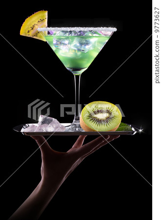 Cocktail Smoothie, with slices of kiwi on a black 9773627