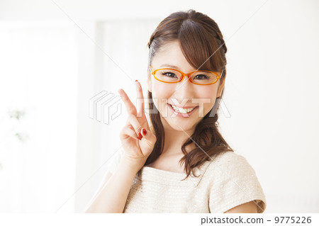 woman doing peace sign woman doing peace sign 9775226