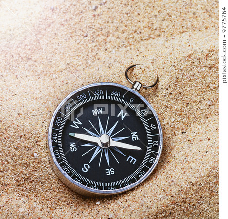 compass on the hot sand compass on the hot sand 9775764