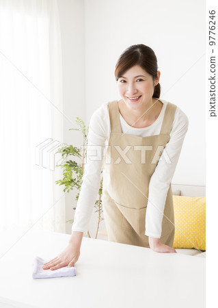 Woman doing housework Woman doing housework 9776246