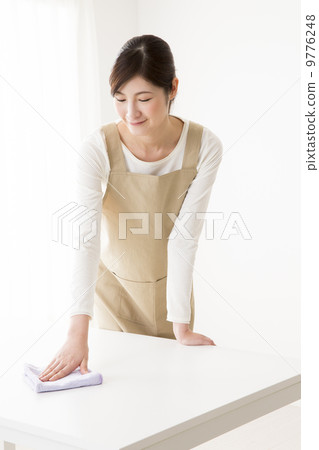 Woman doing housework Woman doing housework 9776248