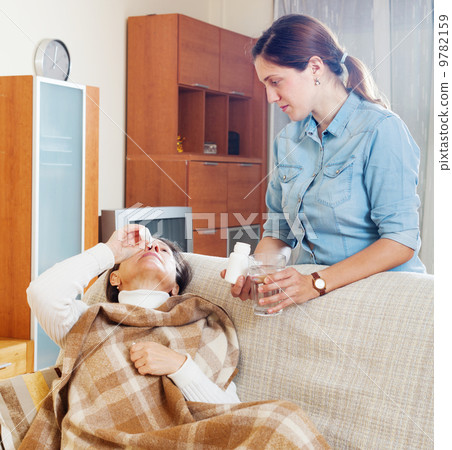 Mature woman dripping nasal drops 9782159