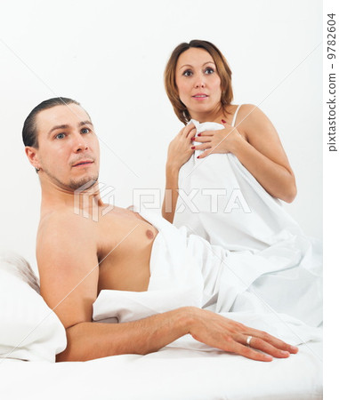 Loving couple caught in bed Loving couple caught in bed 9782604