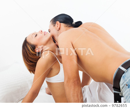 Loving middle-aged couple in bed Loving middle-aged couple in bed 9782655