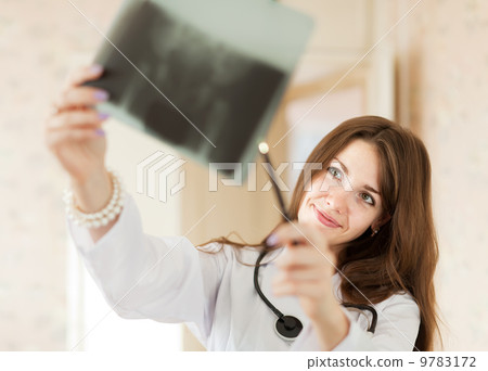 Doctor looking an x-ray Doctor looking an x-ray 9783172