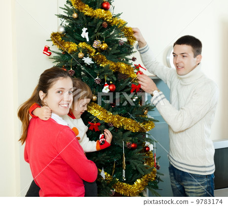 girl and guy with his baby girl at home girl and guy with his baby girl at home 9783174