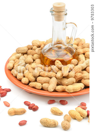 Peanuts and peanut butter isolated on white background Peanuts and peanut butter isolated on white background 9783303