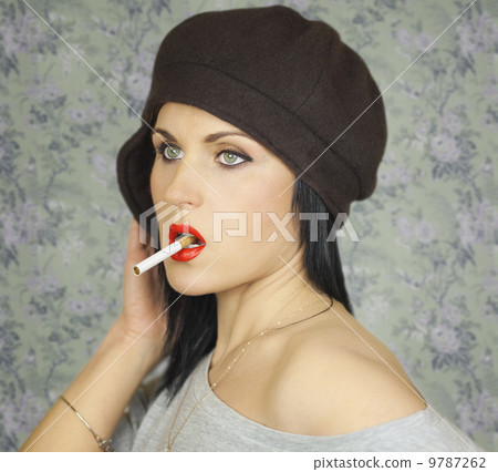 Woman with cigarette in indoor Woman with cigarette in indoor 9787262