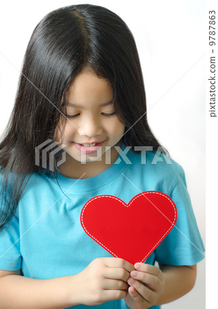 Little Girl Holding Heart-Shaped Little Girl Holding Heart-Shaped 9787863