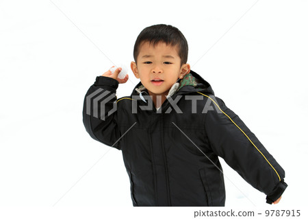 Young child playing snowball fight (4 year old child) 9787915