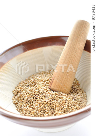 White sesame paste and mortar White sesame paste and mortar 9789435