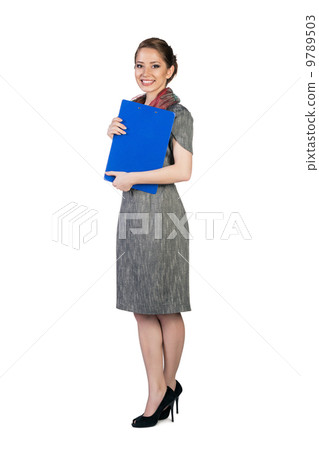 Beautiful young business woman with folder 9789503