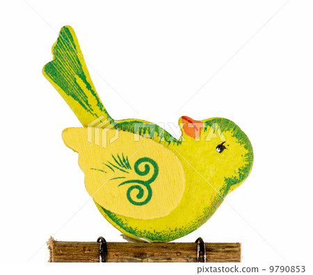 Cute yellow bird carved of wood Cute yellow bird carved of wood 9790853