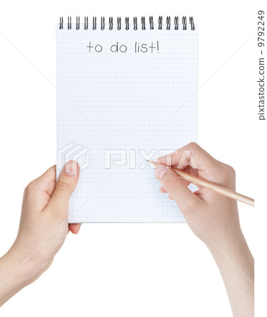 female teen girls holding notepad with to-do list 9792249