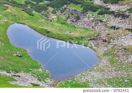 Alpine lake Brebeneckul on summer mountains Alpine lake Brebeneckul on summer mountains 9792451