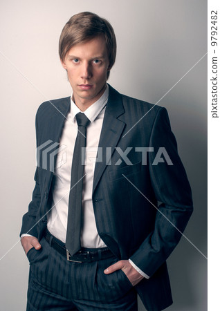 guy in black expensive suit 9792482