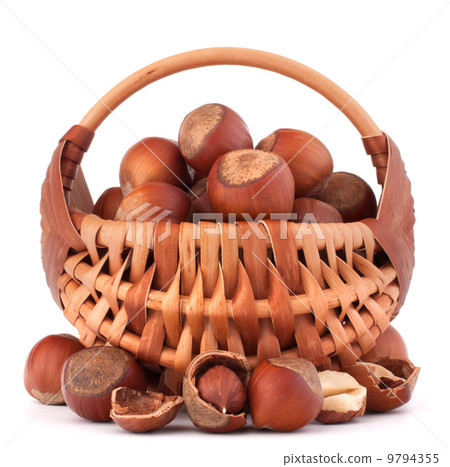 Hazelnuts in wicker basket 9794355