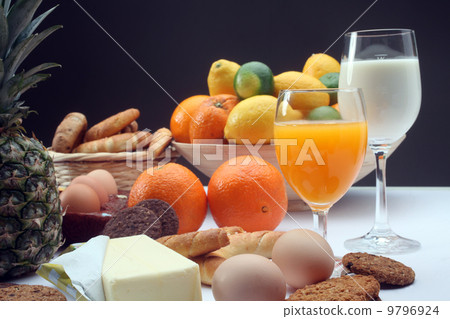 Breakfast with juice, milk, fruits and eggs Breakfast with juice, milk, fruits and eggs 9796924