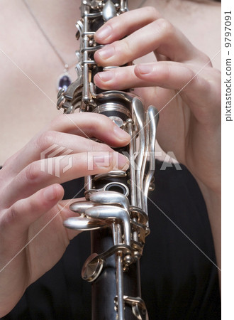 Hands of Female Musician Playing Clarinet Hands of Female Musician Playing Clarinet 9797091