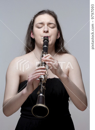 Young Female Musician Playing Clarinet Young Female Musician Playing Clarinet 9797093