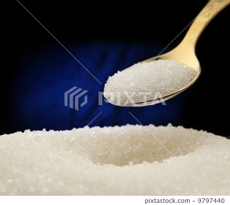White sugar and spoon White sugar and spoon 9797440
