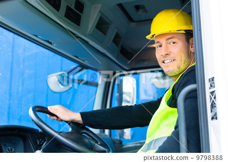 builder driving with truck of construction site 9798388