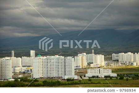 View of the new neighborhood on a background of mountains View of the new neighborhood on a background of mountains 9798934