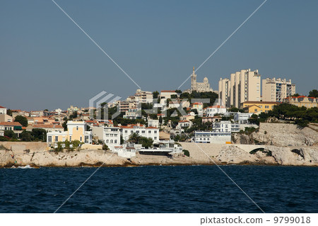 View of notre dame de la garde church, and Marseille from a boat View of notre dame de la garde church, and Marseille from a boat 9799018