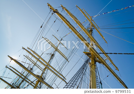 Mast with sails of an old sailing vessel 9799531