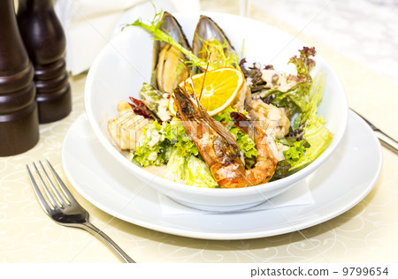 seafood salad on a white background in the restaurant seafood salad on a white background in the restaurant 9799654