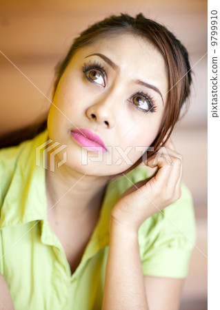 Asian girl portraiture  thinking 9799910