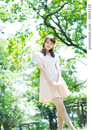 A woman in green 9804126