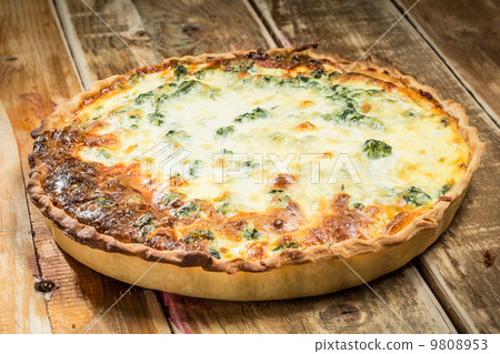 A hot chicken pot pie cooling on the table 9808953