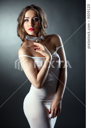 Portrait of sensual model in skin-tight negligee 9809120