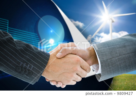 Composite image of business handshake Composite image of business handshake 9809427
