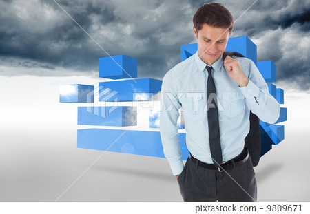 Composite image of smiling businessman holding his jacket 9809671