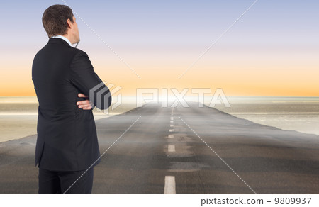 Composite image of thinking businessman 9809937