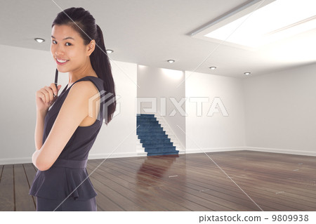 Composite image of thoughtful businesswoman 9809938