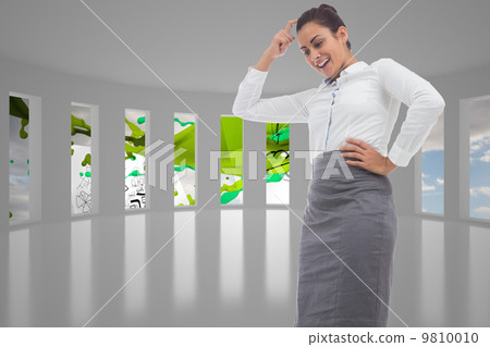 Composite image of smiling thoughtful businesswoman Composite image of smiling thoughtful businesswoman 9810010