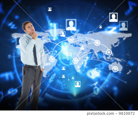 Composite image of thoughtful businessman with hand on chin Composite image of thoughtful businessman with hand on chin 9810072