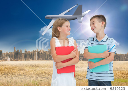 Composite image of smiling brother and sister holding their exer Composite image of smiling brother and sister holding their exer 9810123