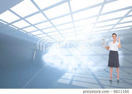 Composite image of stylish businesswoman making gesture while ho Composite image of stylish businesswoman making gesture while ho 9811160