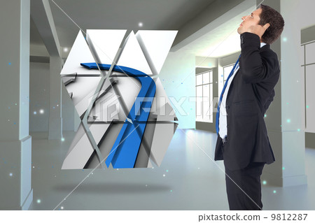 Composite image of thinking businessman scratching head 9812287