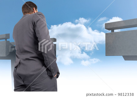 Composite image of thinking businessman Composite image of thinking businessman 9812338