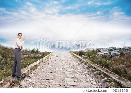 Composite image of thinking businessman holding pen 9813150